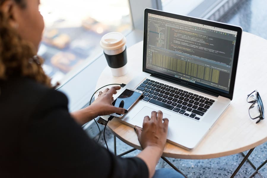 Professional working on a laptop in an office